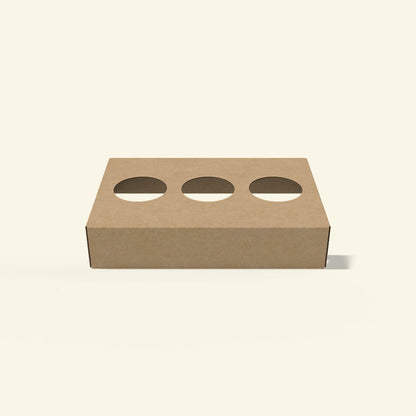 Kraft board packaging with round cutouts for dairy jars